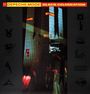 Depeche Mode, Black Celebration; links und rechts grafische Symbole, in der Mitte ein hochformatiges, dunkles Foto.