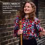 "MERCI, MERCY! works by the enigmatic Luigi Mercy. Mirjam-Luise Münzel & Ensemble. Frau mit Flöte vor Ziegelwand."