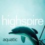 Text: "highspire" groß, "aquatic" kleiner. Ein schwimmender Delfin im blauen Wasser.