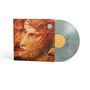 "Loreena McKennitt: To Drive the Cold Winter Away" steht auf einem Albumcover mit Gemälde von zwei Gesichtern. Vinyl in Marmormuster.