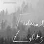 "We Were Found In The Fog" und "Federal Lights" in weißen Buchstaben auf nebligem Waldhintergrund.