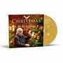 "CHRISTMAS WITH KARL JENKINS" steht groß auf einem festlich dekorierten CD-Cover mit einem Mann, der dirigiert.