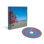 CD-Hülle mit Text "THE CRANBERRIES. Bunte Luftballons schweben über einem sandigen Strand unter blauem Himmel."