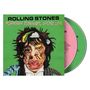 "ROLLING STONES - FOREIGN TONGUES, LOOSE LIPS." Illustration mit verzerrtem Gesicht und zwei CDs, grün und rosa.