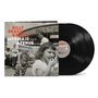 "BILLY BRAGG & WILCO MERMAID AVENUE Vol. III" in kräftigen Schriftzügen. Schwarze Vinyl-Schallplatten liegen dabei.