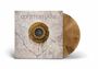"Whitesnake" steht auf einem gemusterten Untergrund. Goldenes Emblem mit Buchstaben in der Mitte. Beige vinylartige Scheibe.