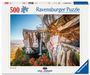 Ravensburger Puzzle, 500 Teile. Bild zeigt eine beeindruckende Felslandschaft mit Wasserfall und bunter Herbstvegetation.