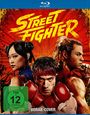 "Street Fighter" in gelber Schrift vor rotem Hintergrund, drei Kämpfer im Vordergrund, FSK 12-Symbol, Hinweis "VORAB-COVER".
