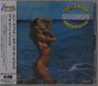 Links japanischer Textstreifen, rechts "Tony Valor Sounds Orchestra". Frau in gelbem Bikini vor blauem Meer.