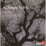 "As Simple As It Is" von Dusko Goykovich, International Quintet, live at the Domicile, Munich. Baumzweige im Hintergrund.
