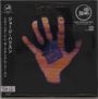 Texte: „Dark Horse Records“, „George Harrison“. Japanische Schriftzeichen. 

Logo: Ein stilisiertes Pferd, weiße Umrisse.

Eine erleuchtete Hand mit einem Bild darin.