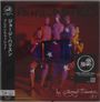 "Rainwashed", japanische Schriftzeichen, "Dark Horse Records" Logo, Puppen halten einen Fernseher mit Stern.