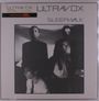 "Oberer Text: ULTRAVOX, darunter SLEEPWALK. Schwarz-weiß Foto von vier Personen in Anzug. Links oben orangener Hinweis."