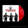 "The Job" in Rot, Logo mit Linien, unter drei Silhouetten; rotes Vinyl auf weißem Hintergrund.