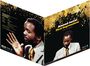 „Ahmad Jamal First Impressions Live in Paris“. Goldene Spritzer auf schwarzem Hintergrund, Mann im Anzug.