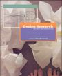 "Design Research: Methods and Perspectives", bearbeitet von Brenda Laurel. Papier und Füße sind auf dem Boden verteilt.