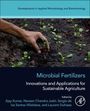 "Developments in Applied Microbiology and Biotechnology. Microbial Fertilizers: Innovations for Sustainable Agriculture." Eine Hand pflanzt Setzlinge in Erde.