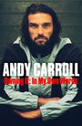 ANDY CARROLL, Owning It: In My Own Words. Ein Mann mit Bart, ernstem Blick und verschränkten Armen.