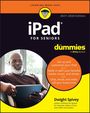 „iPad for Seniors for dummies“, 2027–2028 Edition. Ein älterer Mann nutzt ein Tablet.