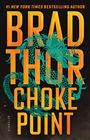 Text: "Brad Thor Choke Point". Illustration eines türkisfarbenen Drachens auf schwarzem Hintergrund.