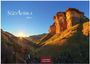 Text: "SÜDAFRIKA 2027", "CASARES EDITION". Ein Sonnenaufgang beleuchtet eine felsige Landschaft in warmen Farben.