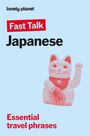 „Fast Talk Japanese“; „Essential travel phrases“. Illustration einer Winkekatze vor blauem Hintergrund.