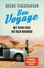 „Bon Voyage. Mit Papas Benz bis nach Marokko.“ Ein Mann steht in der Wüste neben einem offenen Auto.