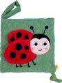 Illustration: Ein fröhlicher Marienkäfer, rote Flügel mit schwarzen Punkten, auf einem grünen Hintergrund.