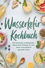 „Wasserkefir Kochbuch“ steht über Getränken, Früchten und Gewürzen verteilt.