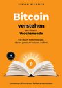 "Bitcoin verstehen an einem Wochenende." Ein Buch für Einsteiger mit 17 Grafiken. Offenes Buch mit Bitcoin-Symbol.