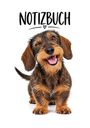 Der Text „NOTIZBUCH“ steht über einem fröhlichen Dackel, der mit einem Auge zwinkert und die Zunge herausstreckt.