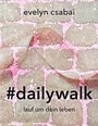 Texte: "evelyn csabai", "#dailywalk", "lauf um dein leben". Hintergrund: Pflastersteine mit rosa Blüten und einem Band.