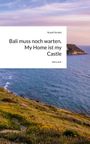 Text: Bali muss noch warten. My Home is my Castle. Am Meer gelegene Klippenlandschaft mit blühenden Wiesen.
