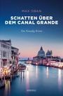 „Max Oban, Schatten über dem Canal Grande, Ein Venedig Krimi.“ Abendstimmung in Venedig, beleuchtete Gebäude am Kanal.