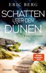 Text: "Eric Berg Schatten über den Dünen Kriminalroman". Ein reetgedecktes Haus in Dünenlandschaft, stürmischer Himmel.