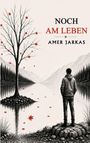 Titel: "Noch am Leben", Autor: Amer Jarkas. Eine Illustration: Ein Baum mit roten Blättern, Mann blickt auf ruhigen See.