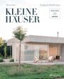 „KLEINE HÄUSER“, „Die Sieger des HÄUSER-Awards“, moderne Glasarchitektur mit zwei Liegestühlen im Garten.
