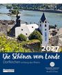 „Die Schönen vom Lande, Dorfkirchen entlang des Rheins, 2021.“ Blick auf eine Kirche nahe eines Flusses, umgeben von Grün.