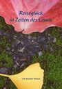 "Reiseglück in Zeiten des Chaos" von Ute Büchter-Römer. Ein rotes und ein gelbes Blatt liegen auf moosigem Untergrund.