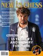 Titel: "NEW IN CHESS". 
Großer Text: "15 YEARS #1 AND HUNGRY FOR MORE". 
Abgebildet ist ein Mann im Anzug mit Schachlogos.