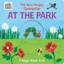 "THE VERY HUNGRY CATERPILLAR AT THE PARK. A Magic Wheel Book." Illustration mit Raupe, Blumen, Biene und Vogel.
