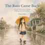 "The Rain Came Back", Buch von Gemma Ryu. Mädchen mit Regenschirm auf nasser Straße, von Bäumen und Häusern gesäumt.