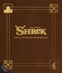 Text: "DreamWorks Shrek The Illustrated Novelization." Stil eines Buchcovers mit goldenen Verzierungen und Symbolen.