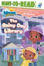 "Ready to Read: The Rainy Day Library, Level Two. Zwei Kinder in Regenkleidung vor einem kleinen Bücherschrank im Regen."